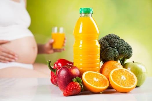 Pregnancy, healthy food and people concept