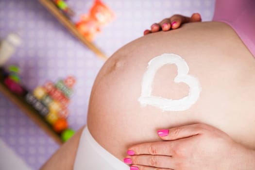 Pregnant woman loving her baby