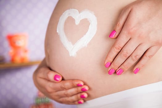 Pregnant woman loving her baby
