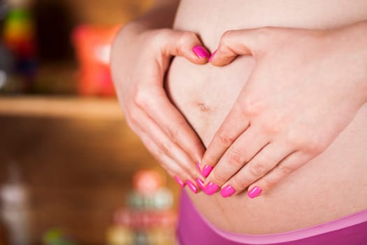 Pregnant woman loving her baby