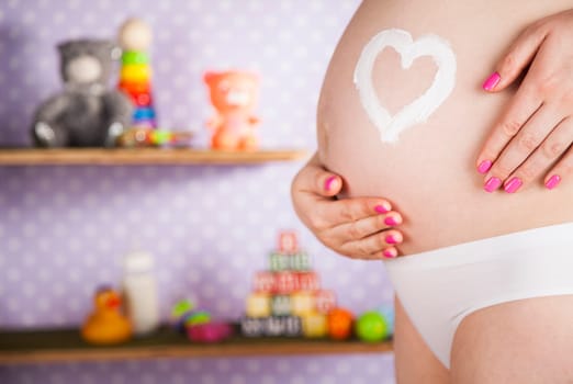 Pregnant woman loving her baby
