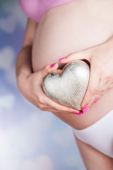 Pregnant woman loving her baby