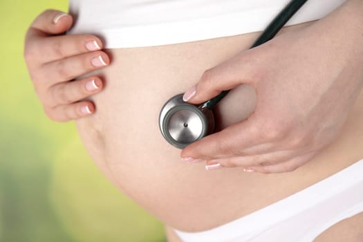Pregnant woman loving her baby