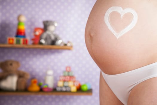 Pregnant woman loving her baby