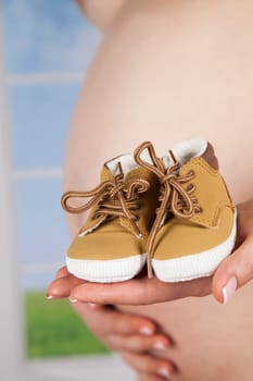 Pregnant woman loving her baby