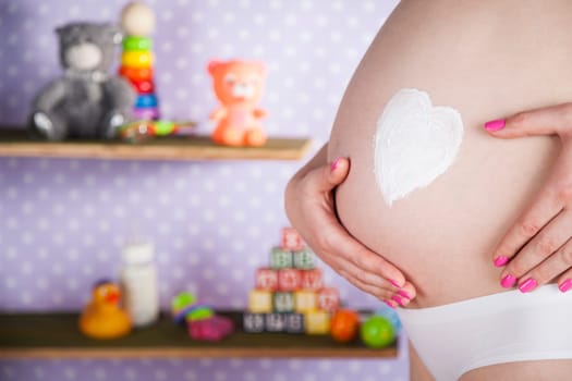 Pregnant woman loving her baby