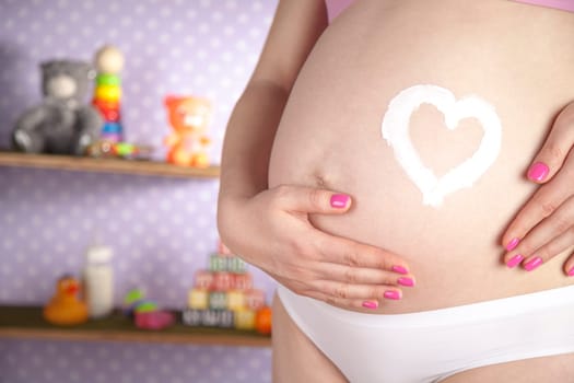 Pregnant woman loving her baby