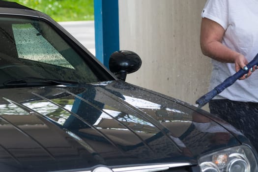 Clean the car with a pressure washer.