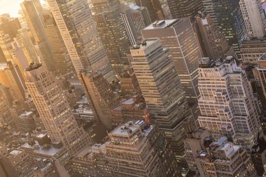 Aerial view of New York City skyline with Manhattan midtown urban skyscrapers at dramatic after the storm sunset, USA.