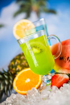Summer drink with blur beach on background