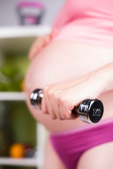 Pregnancy, sport, fitness, healthy lifestyle concept