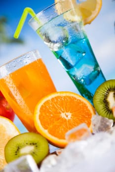 Summer drink with blur beach on background