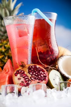 Summer drink with blur beach on background