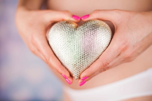 Pregnant woman loving her baby