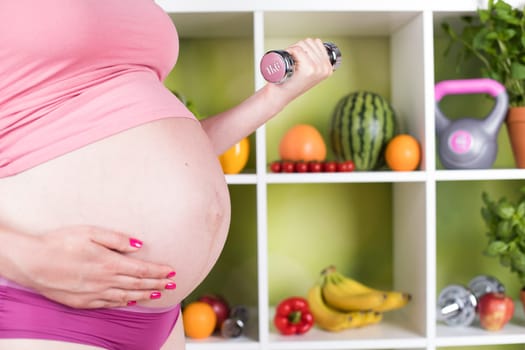 Pregnancy, healthy food and people concept