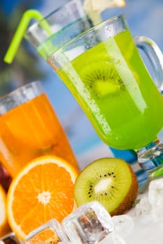 Summer drink with blur beach on background