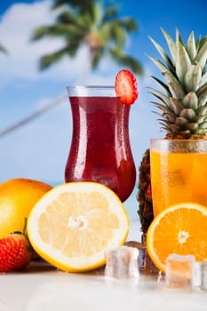 Summer drink with blur beach on background