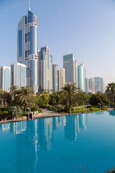 DUBAI, UAE - SEP 29, 2014: Skyscrapers along the Sheikh Zayed Road in Dubai on Sep 29, 2014.