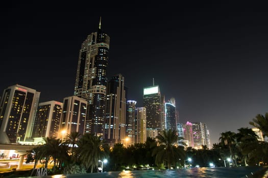 DUBAI, UAE - SEP 29, 2014: Skyscrapers along the Sheikh Zayed Road in Dubai on Sep 29, 2014.