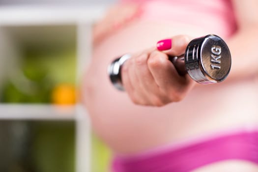 Pregnancy, sport, fitness, healthy lifestyle concept