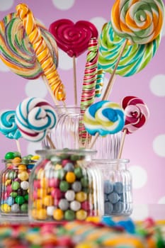 Glass jars in Colorful candies,lollipops and gum balls