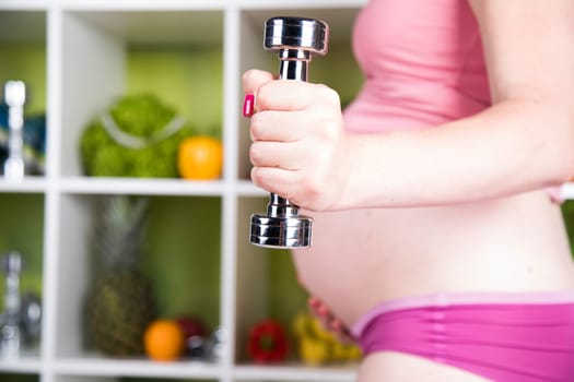 Pregnancy, sport, fitness, healthy lifestyle concept