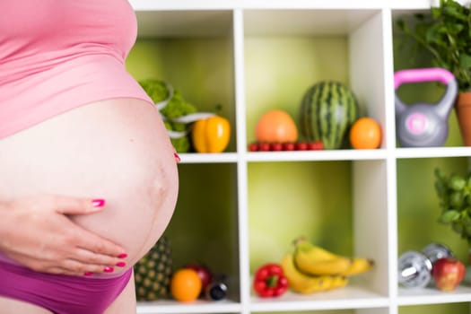 Pregnancy, healthy food and people concept