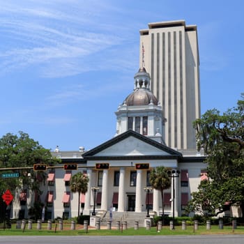 Tallahassee, FL, USA - May 13, 2018: Front of historic state capital downtown. Historic State Capital in front of the Florida State Capital. Old Florida State Capital in front of the newer building.