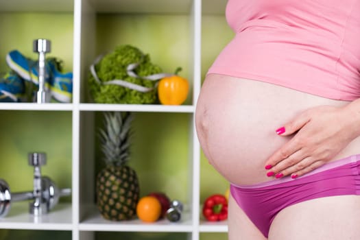 Pregnancy, healthy food and people concept