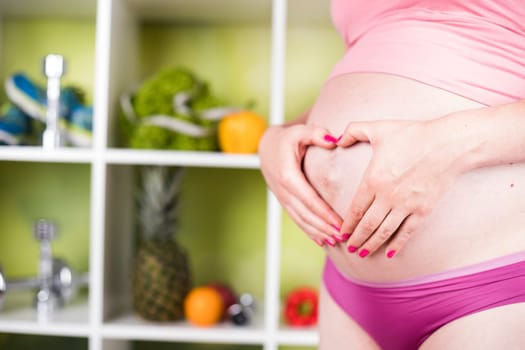 Pregnancy, healthy food and people concept