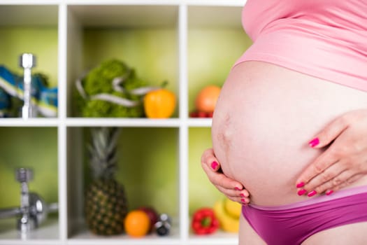 Pregnancy, healthy food and people concept