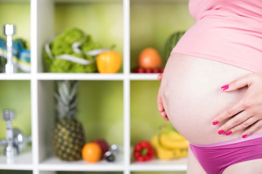 Pregnancy, healthy food and people concept