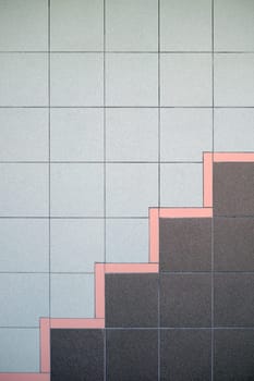 The close-up of square tiles in retro colors.