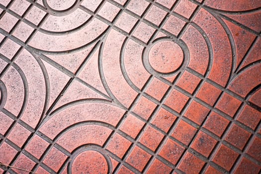 red tile on the floor at the public walkway
