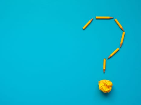 Question mark of yellow pencils with crumpled paper, creativity or ideas concept