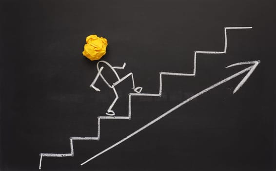 Success or great idea concept on a chalkboard with crumpled paper