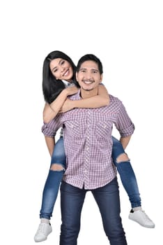 Smiling asian couple having fun together isolated over white background