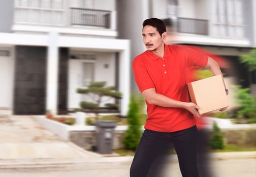 Young asian courier man deliver the package to home