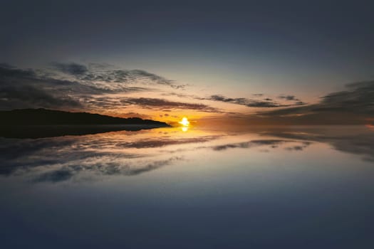 Beautiful sunrise on the ocean with dramatic sky background