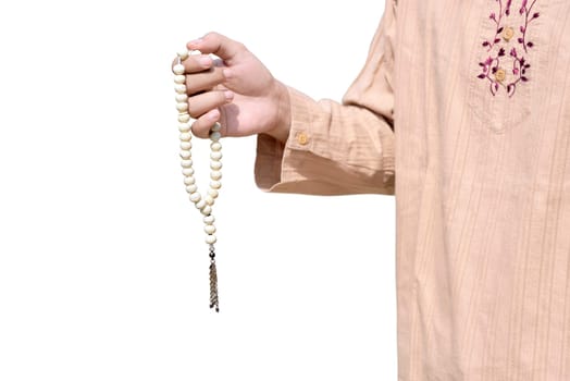 Muslim man holding prayer beads isolated over white background