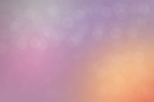 Blurred bright abstract Bokeh, colorful gradient defocused and pink orange colored. Beautiful texture. Card concept.