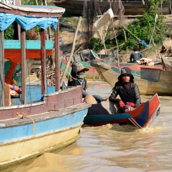 people at the daily life at the Lake Village Kompong Pluk at the Lake Tonle Sap near the City of Siem Riep in the west of Cambodia.   Cambodia, Siem Reap, April 2014