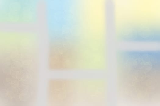 Beautiful colorful bright pastel harmonious texture background. Blurred abstract view to landscape and sky from a window out. Template for your product display montage.