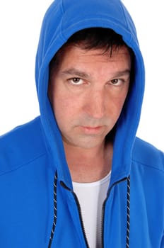 A close up image of a serious looking middle age man in a blue hoody.looking into the camera, isolated for white background.