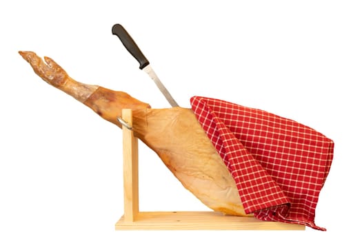 A front leg of a Spanish Serrano ham isolated on white background.