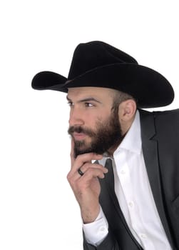 A close up portrait image of a handsome man in a suit and cowboy hat.with a beard and mustache, isolated for white background.
