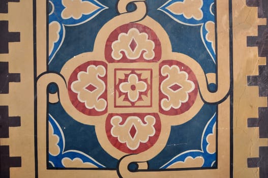 Abstract decorative symbols pattern on church wall.