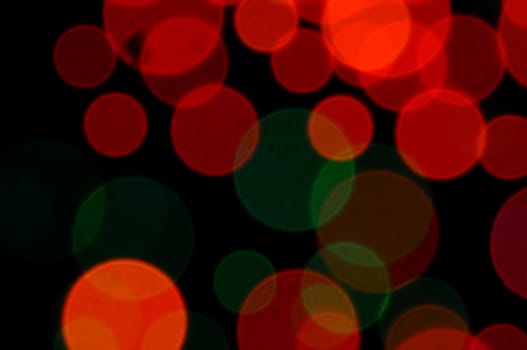 Abstract circles pattern colorful blurry lights at night.