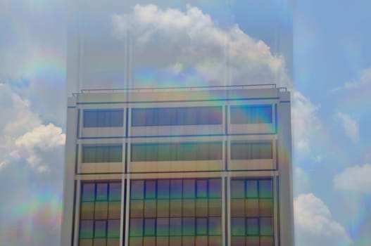 Modern building exterior motion blur through prism. Abstract architecture.