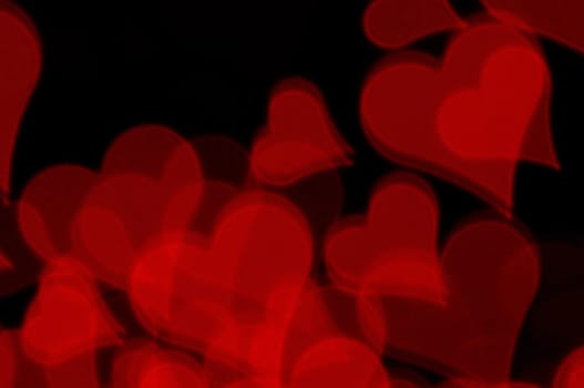 Red hearts blur pattern. Abstract love and romance background.